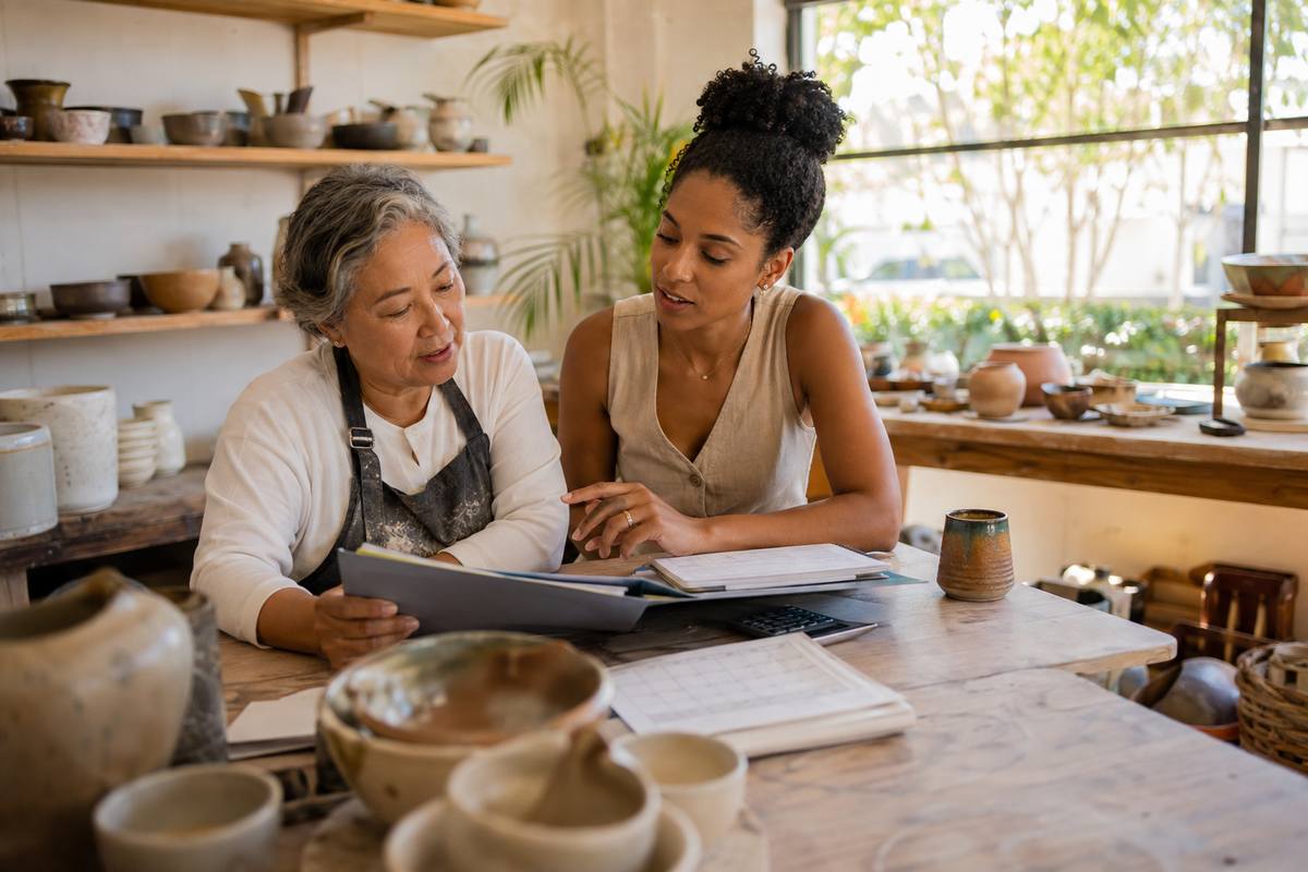 Tax advisor helping a self-employed owner coordinate retirement contributions and quarterly payments
