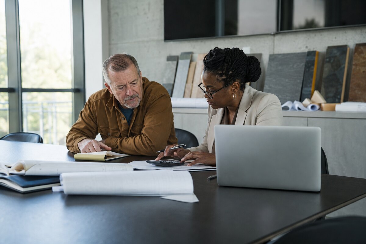 Business owner reviewing a refinancing model